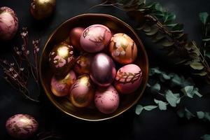 Gold and pink decorated easter eggs painted by hand surrounded by peonies, Easter, stylish minimal composition, flat lay photo