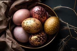 Gold and pink decorated easter eggs painted by hand surrounded by peonies, Easter, stylish minimal composition, flat lay photo