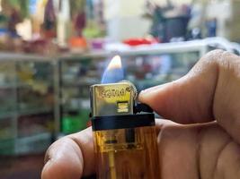 A close up of burning gas lighter photo