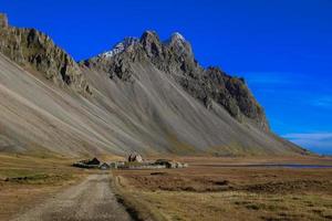 View of a viking village in Stokksnes under Vestrahorn mountain, Iceland photo