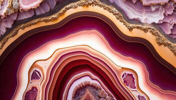 , natural volcanic agate stones close-up pink magenta and golden texture. Wallpaper background, quartz marble, decorative rock pattern photo