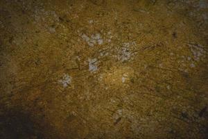 Yellow dirty cement floor. Concrete backgrounds texture photo