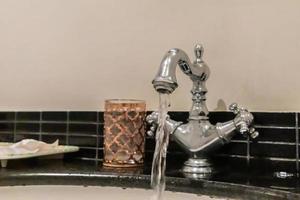 Luxury vintage faucet in the bathroom photo
