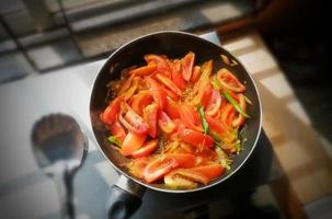 Tomato curry or chutney, A Indian or bangladeshi vegetarian hot and spicy Masala recipe. Tomato vorta, traditional tasty food in Bangladesh. photo