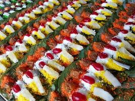 Banarasi pan, betel nut garnished with all indian banarasi ingredients for sale. photo