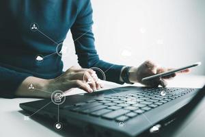 Concept global data connection with internet technology, users are using labtop for online transactions by internet technology, big data, database management, cloud computing, cashless society. photo