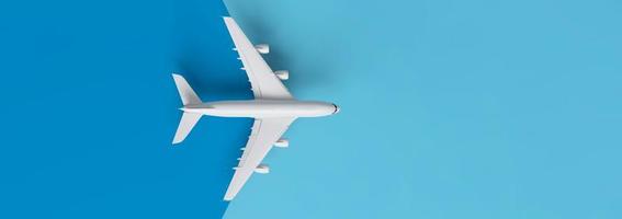 Travel concept with plane on blue background with copy space. photo