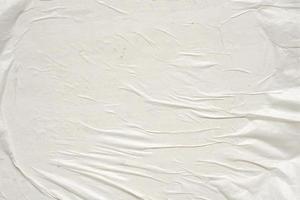 White blank crumpled and creased paper poster texture background photo