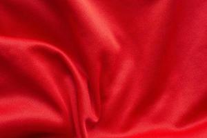 Red sports clothing fabric football shirt jersey texture background photo