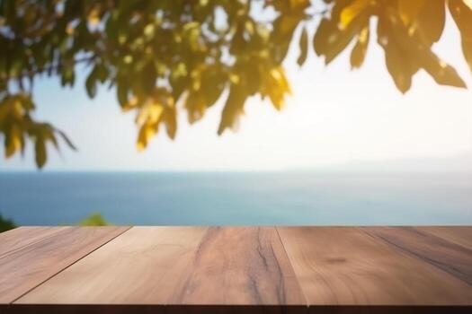 Empty wood table with free space, tree leaves on both sides, blurred farm in background. photo