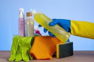 basket with cleaning products for home hygiene use photo