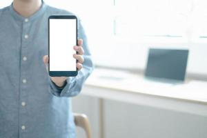 Mockup image of engineers showing smartphone design building Project in office, mockup concept photo