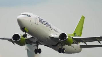 AMSTERDAM, THE NETHERLANDS JULY 26, 2017 - Air Baltic Boeing 737 YL BBR taking off from Shiphol Airport, Amsterdam, Holland video