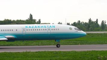 ALMATY, KAZAKHSTAN MAY 4, 2019 - Kazakhstan Kaz Air Trans Tupolev 154 UP T5401 taxiing before departure, Almaty International Airport, Kazakhstan video