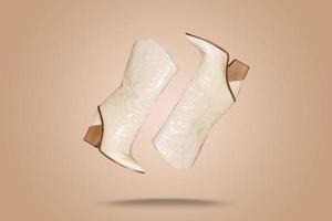 hermosa blanco botas Moda hembra estilo aislado en antecedentes foto