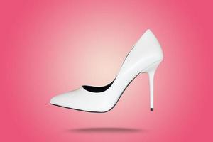 Beautiful white high heel footwear fashion female style isolated on background photo