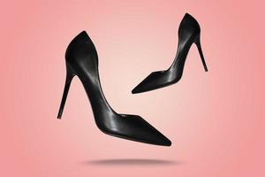 Black high heel footwear fashion female style isolated on pastel background photo