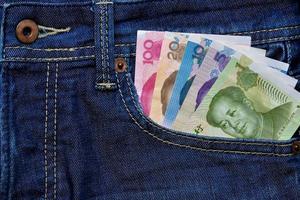 Yuan or RMB in Jean's pocket, Chinese Currency photo