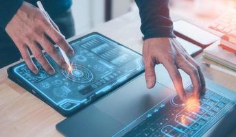 artificial intelligence Digital transformation change management, internet of things. new technology and business strategy, man working on tablet computer laptop, programer design and development. photo