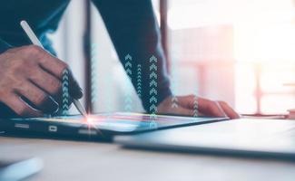 Analyst working with Business Analytics and Data Management System on computer, make a report with KPI and metrics connected to database. Corporate strategy for finance, operations, sales, marketing. photo
