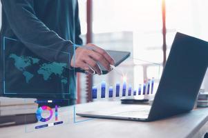 Analyst working with Business Analytics and Data Management System on computer, make a report with KPI and metrics connected to database. Corporate strategy for finance, operations, sales, marketing. photo