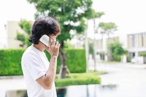 Balancing Work and Leisure, Man Works Remotely by the Pool During Vacation photo