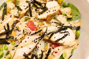 diet breakfast and lunch for weight loss low calorie manege health and fitness. Chicken Salad with Japanese soy marinade and sesame seeds. photo