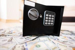 Code lock safe door against dollar money. photo