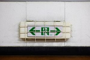 Emergency Exit Sign on Wall. photo