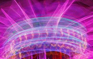 abstract background, movement of merry-go-round in entertainment park photo