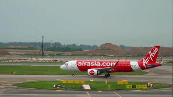 CHANGI, SINGAPORE NOVEMBER 25, 2018  - AirAsia Airbus 320 HS CBF taxiing before departure at Changi airport, Singapore. video