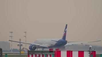 MOSCOW, RUSSIAN FEDERATION JULY 28, 2021 - Boeing 777 of Aeroflot speed up beefore takeoff at Sheremetyevo Airport. Tourism and travel concept video