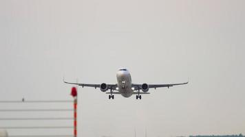 DUSSELDORF, GERMANY JULY 21, 2017 - Eurowings Airbus 320 departure at Dusseldorf airport DUS. Plane retracts landing gear. Airliner took off overhead video