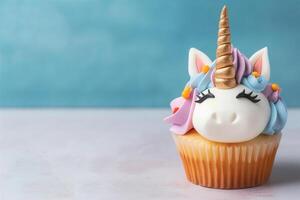 Cute cupcake for kids with copy space. Happy Birthday dessert. Children's party. Empty space for text. Postcard, greeting card design. Unicorn muffin. . photo