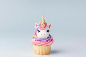 Cute cupcake for kids with copy space. Happy Birthday dessert. Children's party. Empty space for text. Postcard, greeting card design. Unicorn muffin. . photo