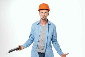 man engineer blueprints builder isolated background photo