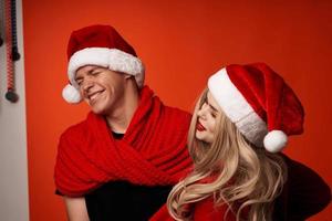 family in santa hats fun new year holiday isolated background photo