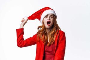 cheerful pretty woman christmas santa claus studio holiday photo