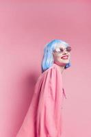 portrait of a woman in sunglasses wears a blue wig makeup Lifestyle posing photo