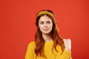 woman in yellow sweater studio street style retro decoration photo