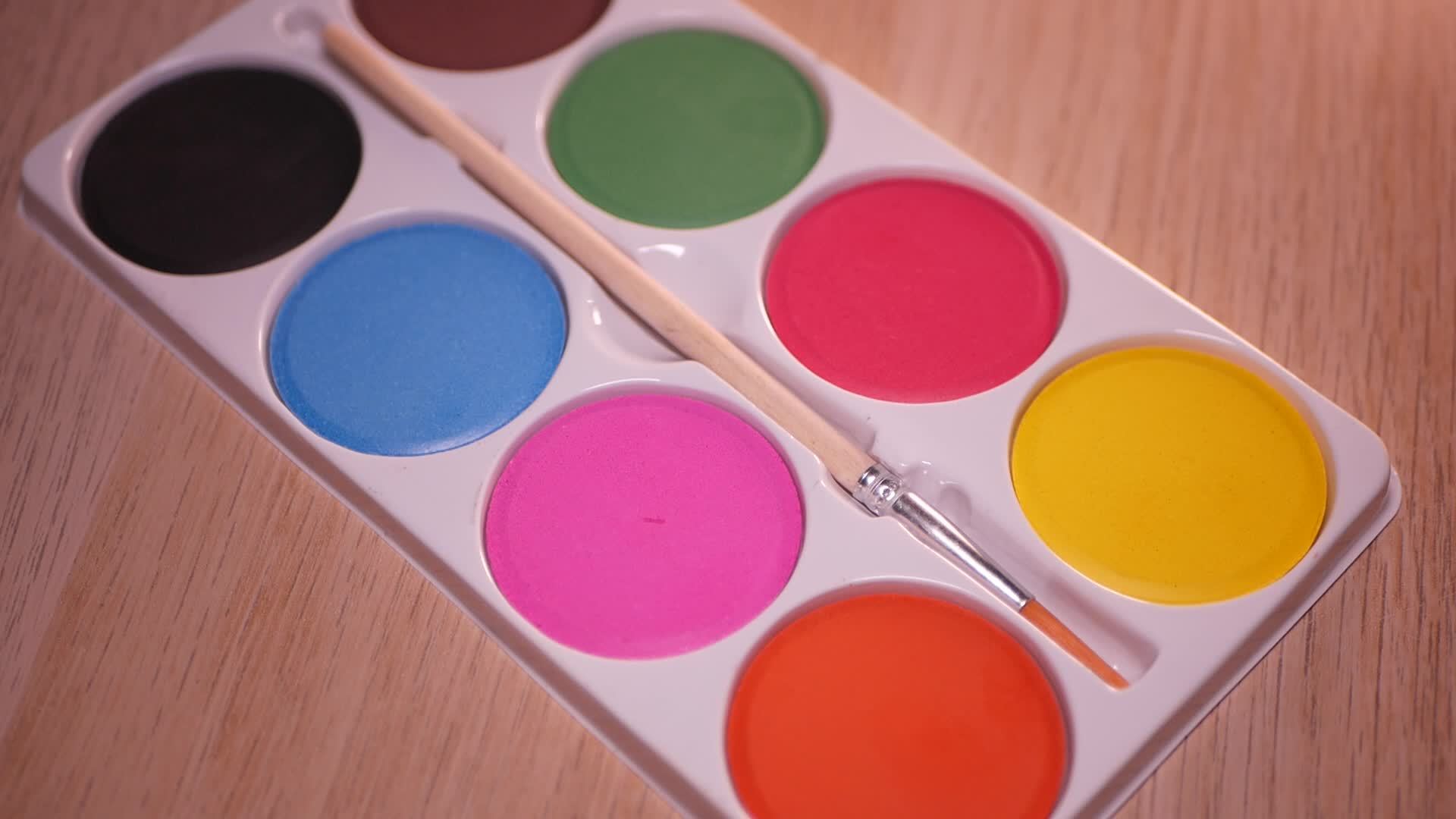 Gouache palette of eight colors closeup 21987636 Stock Video at Vecteezy