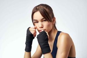 woman sporting boxing bandages rack kickboxing exercise photo