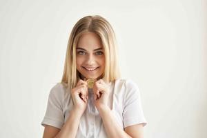 cheerful woman in a white shirt with a folder in hand technologies photo