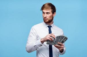 man in shirt with tie finance money in hands wealth photo