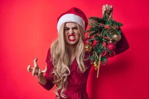 pretty blonde dressed as Santa holiday Christmas tree lifestyle photo