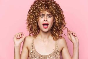 Charming model Curly hair open mouth emotions look ahead fashion clothes photo