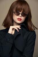 Funny brunette dark coat attractive appearance rejoicing photo