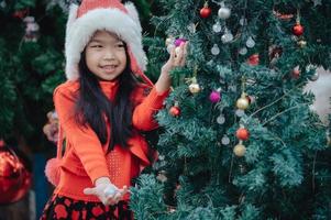 Portrait of little girl in christmas festival,Asian kid winter holiday photo