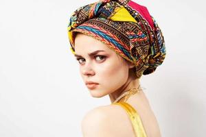 cheerful woman decoration multicolored turban ethnicity fashion studio photo