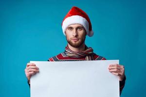 emotional man in a christmas white mockup Poster blue background photo